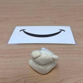 Does it look like a smile or a frown?